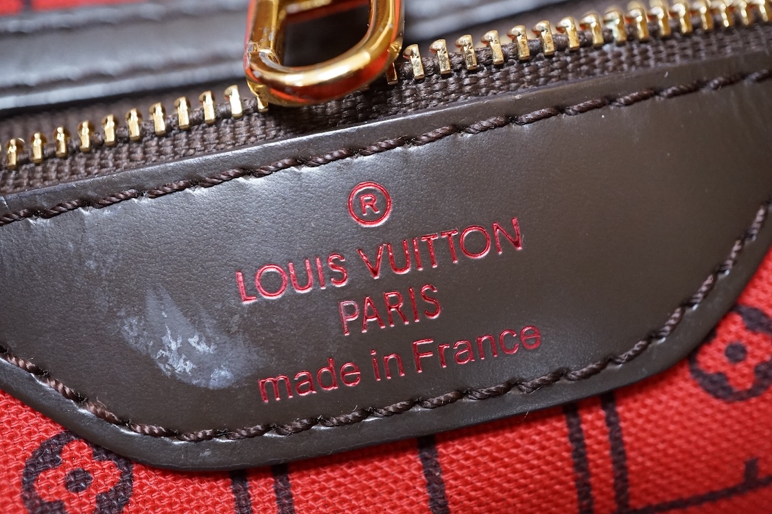 A Louis Vuitton Neverfull small tote bag, with interior pocket, numbered FH0168, 36cm wide